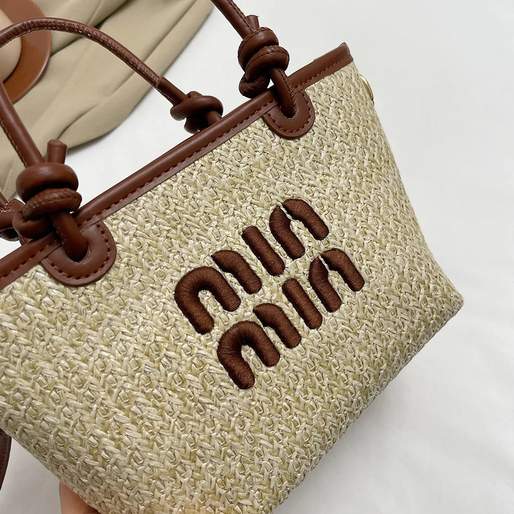 Hand-embroidered straw bag