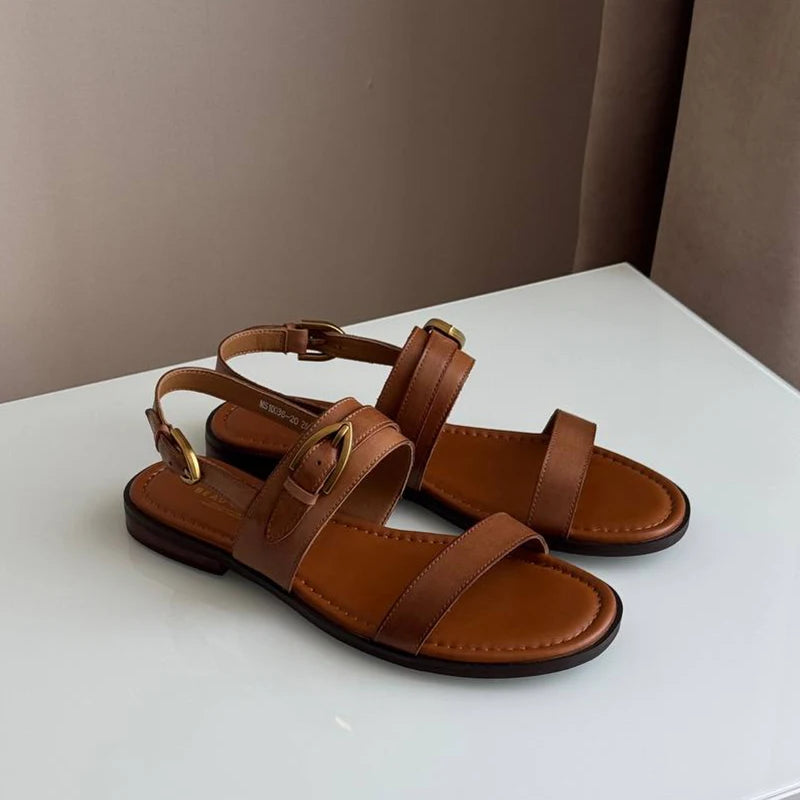 Real leather flat sandal with metal buckle