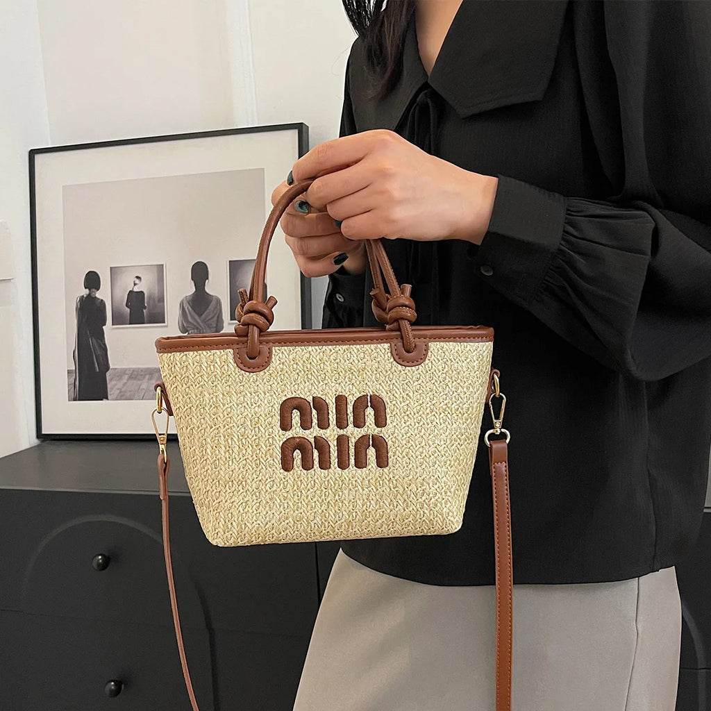 Hand-embroidered straw bag