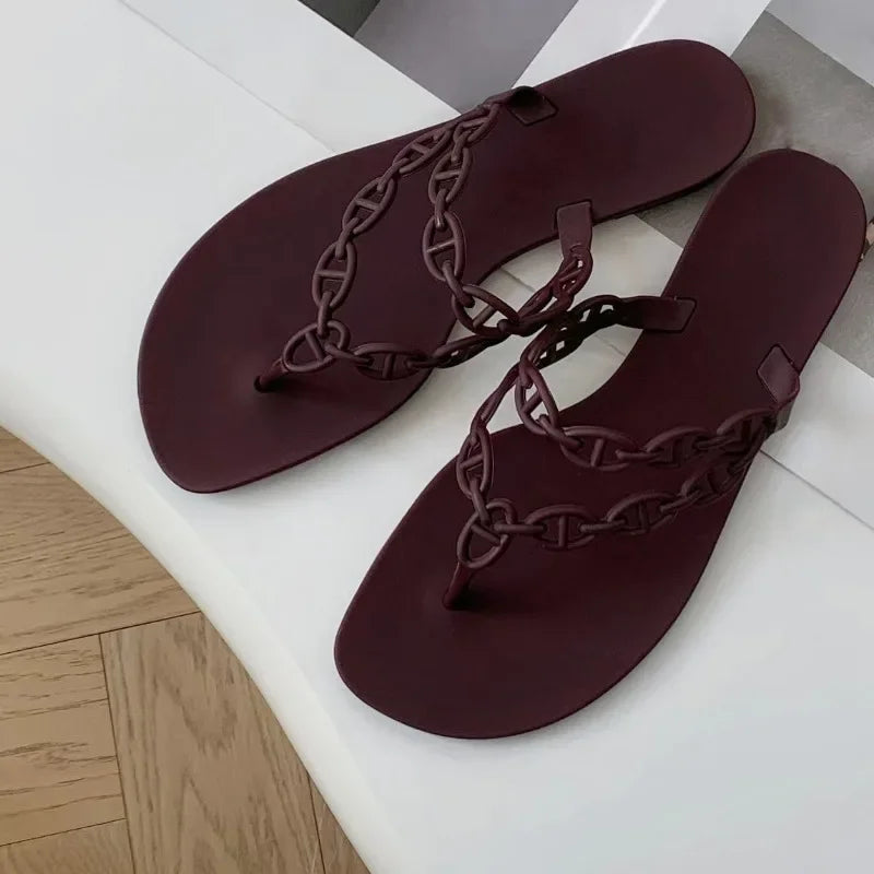 Transparent arch-adorned flip-flop