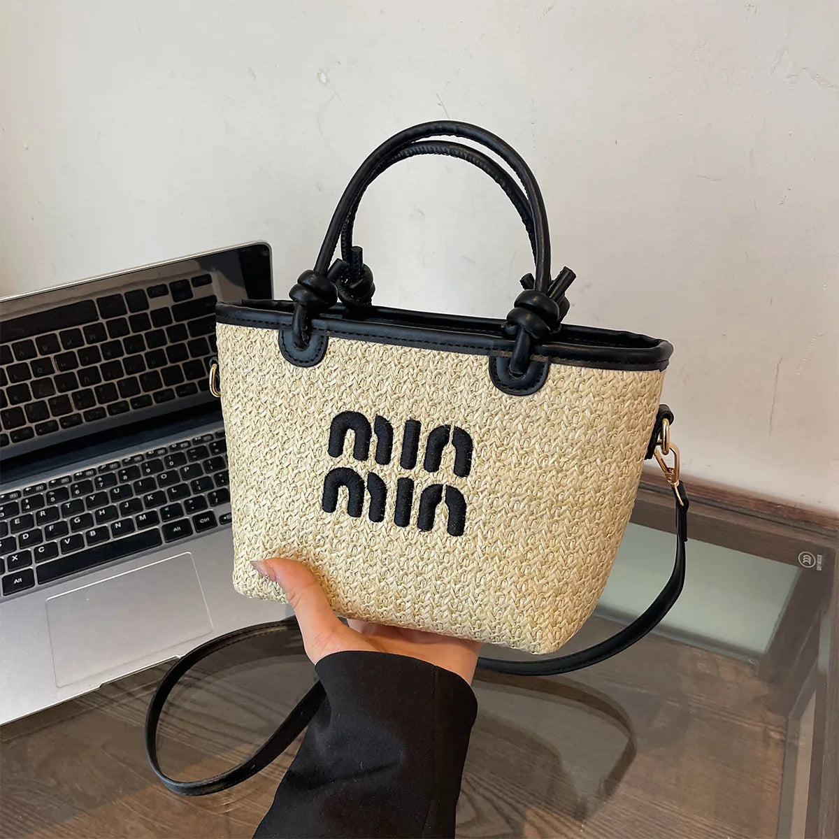 Hand-embroidered straw bag
