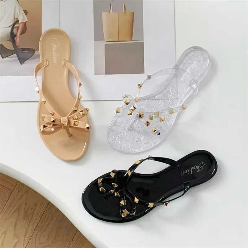 Transparent arch-adorned flip-flop