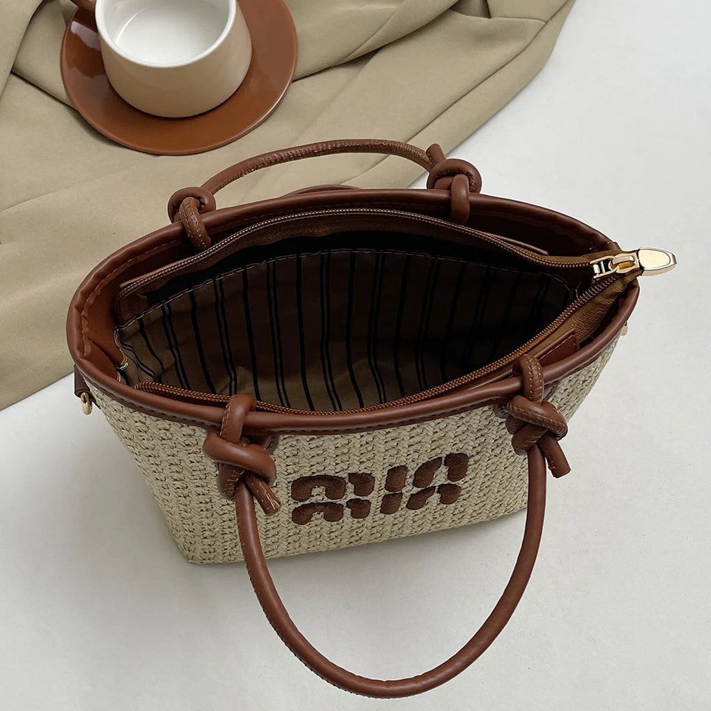 Hand-embroidered straw bag