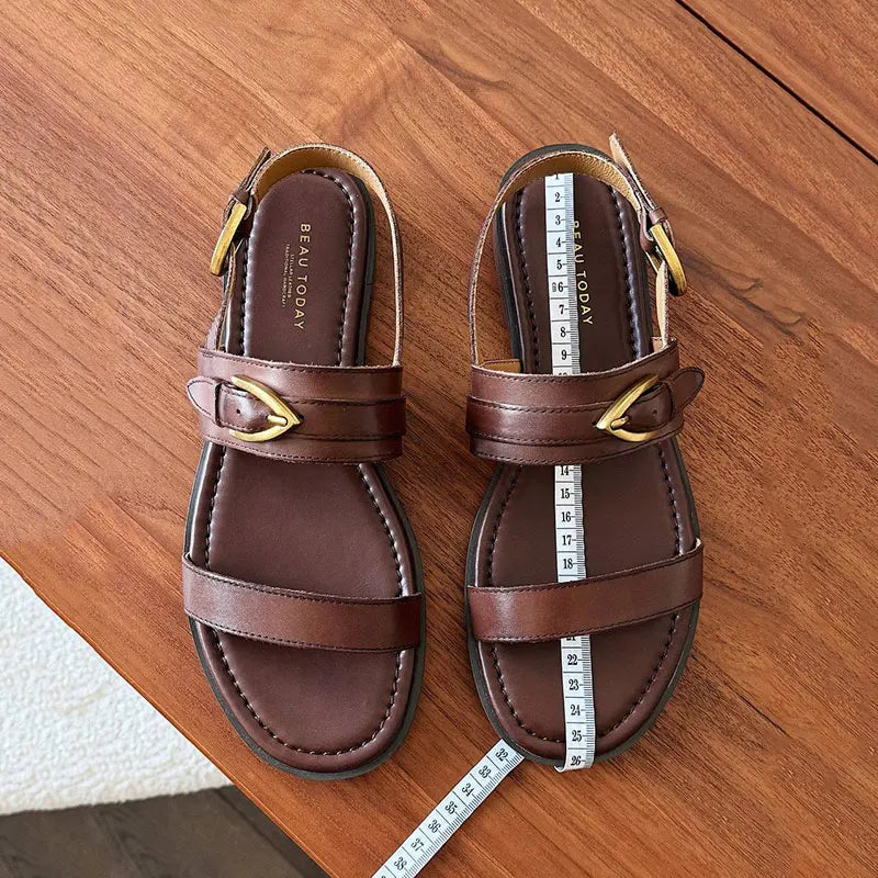 Real leather flat sandal with metal buckle