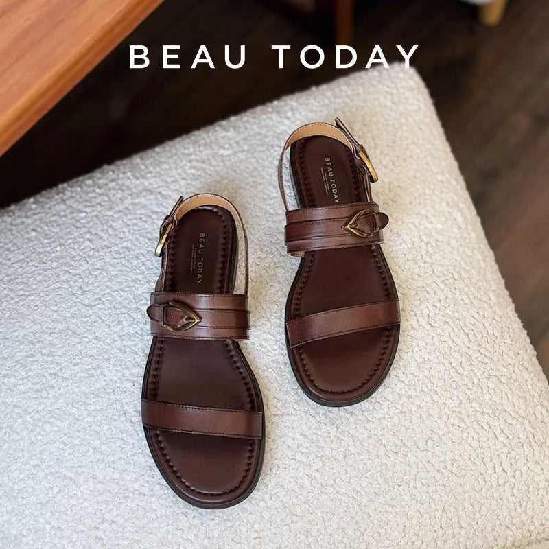 Real leather flat sandal with metal buckle